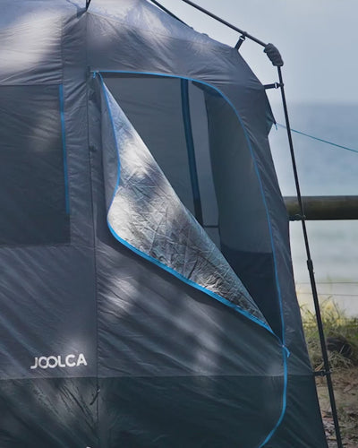 Joolca Ensuite Double tent set up outdoors with the door partially open